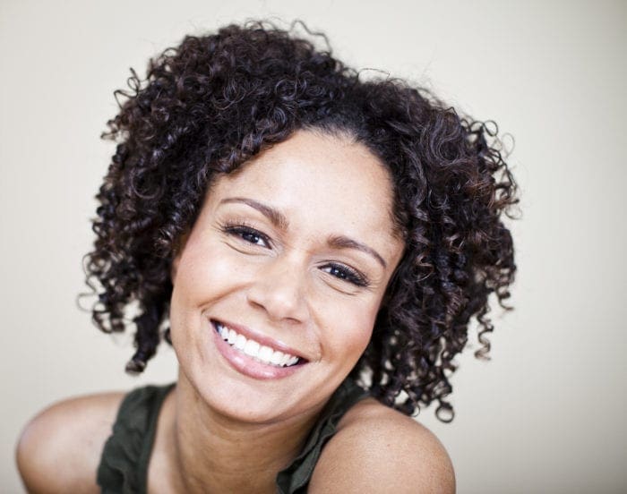 Headshot of a smiling girl.