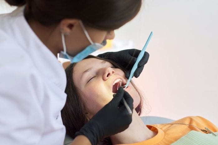 Image of a girl receiving sedation dentistry.