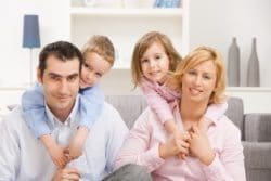 Family smiling at the dental office.