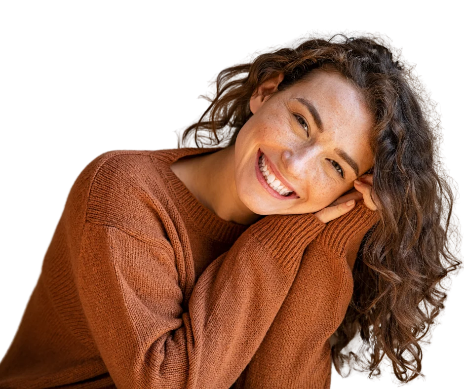 A girl smiling.
