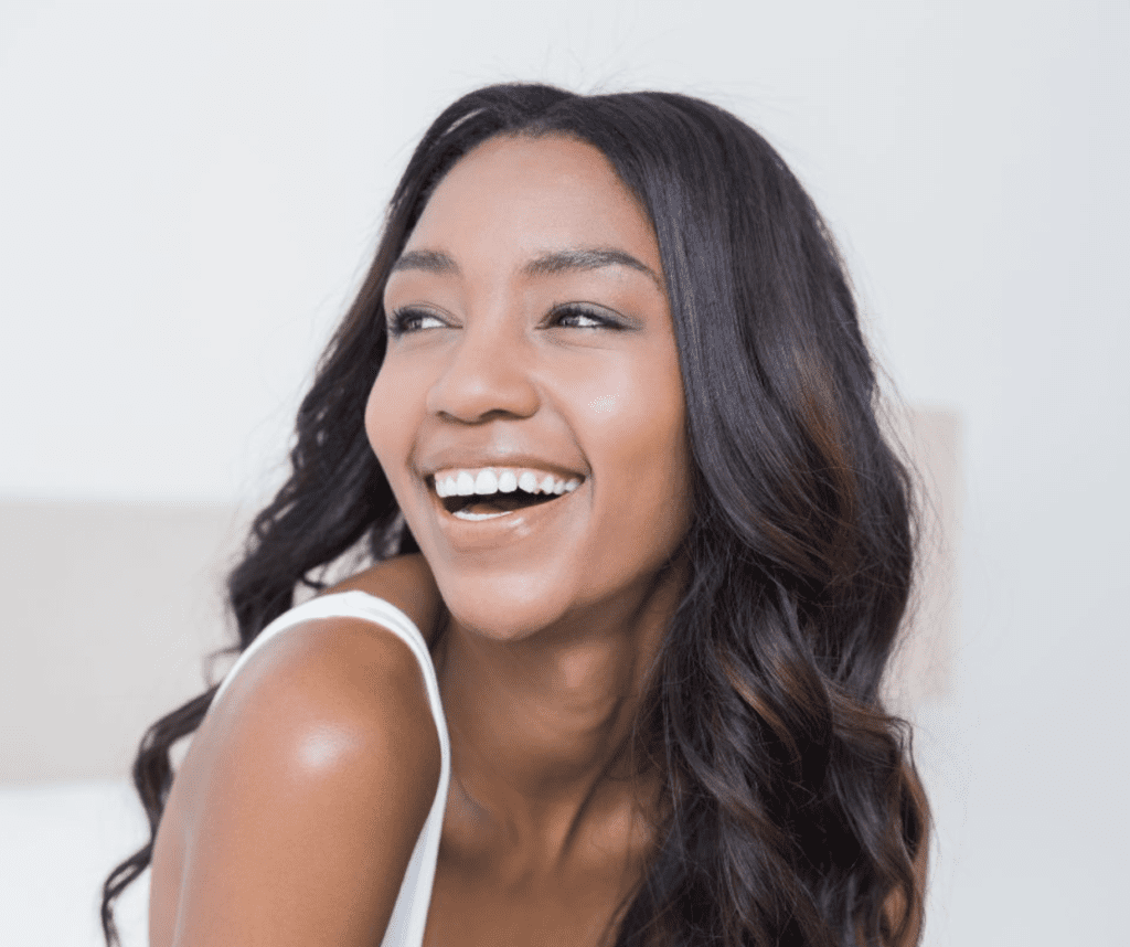 A woman smiling.
