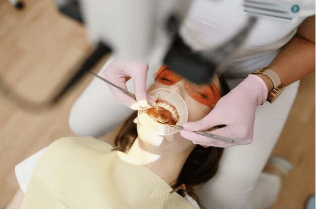 A patient receiving a dental crown at Sudbury Dental Arts.