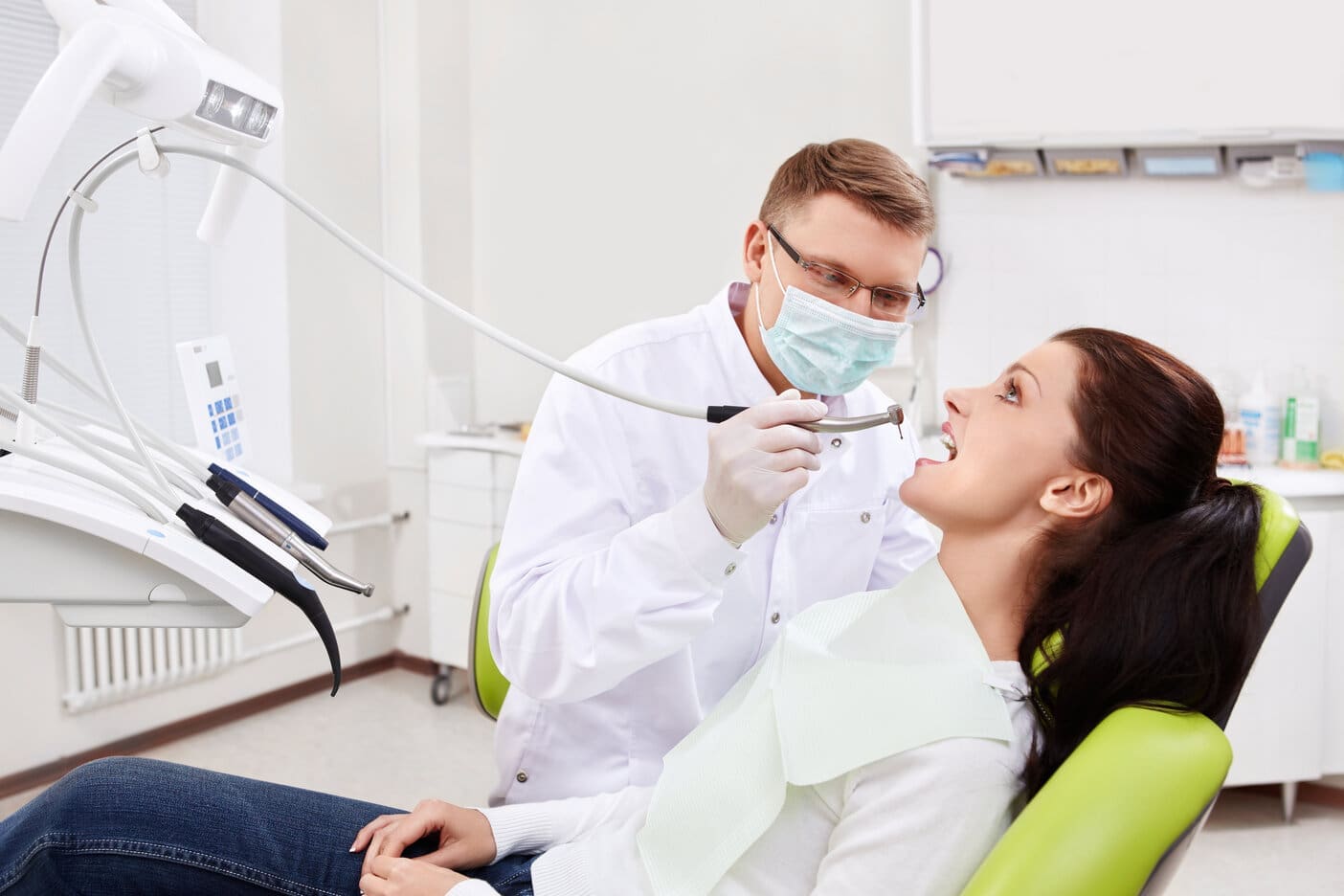 Dentist explaining root canal procedure to patient at Sudbury Dental Arts.