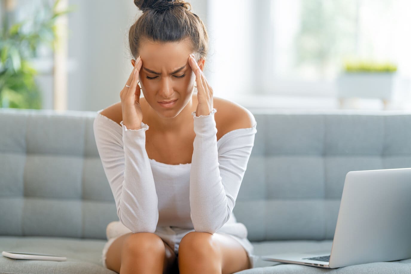 Woman with a head ache