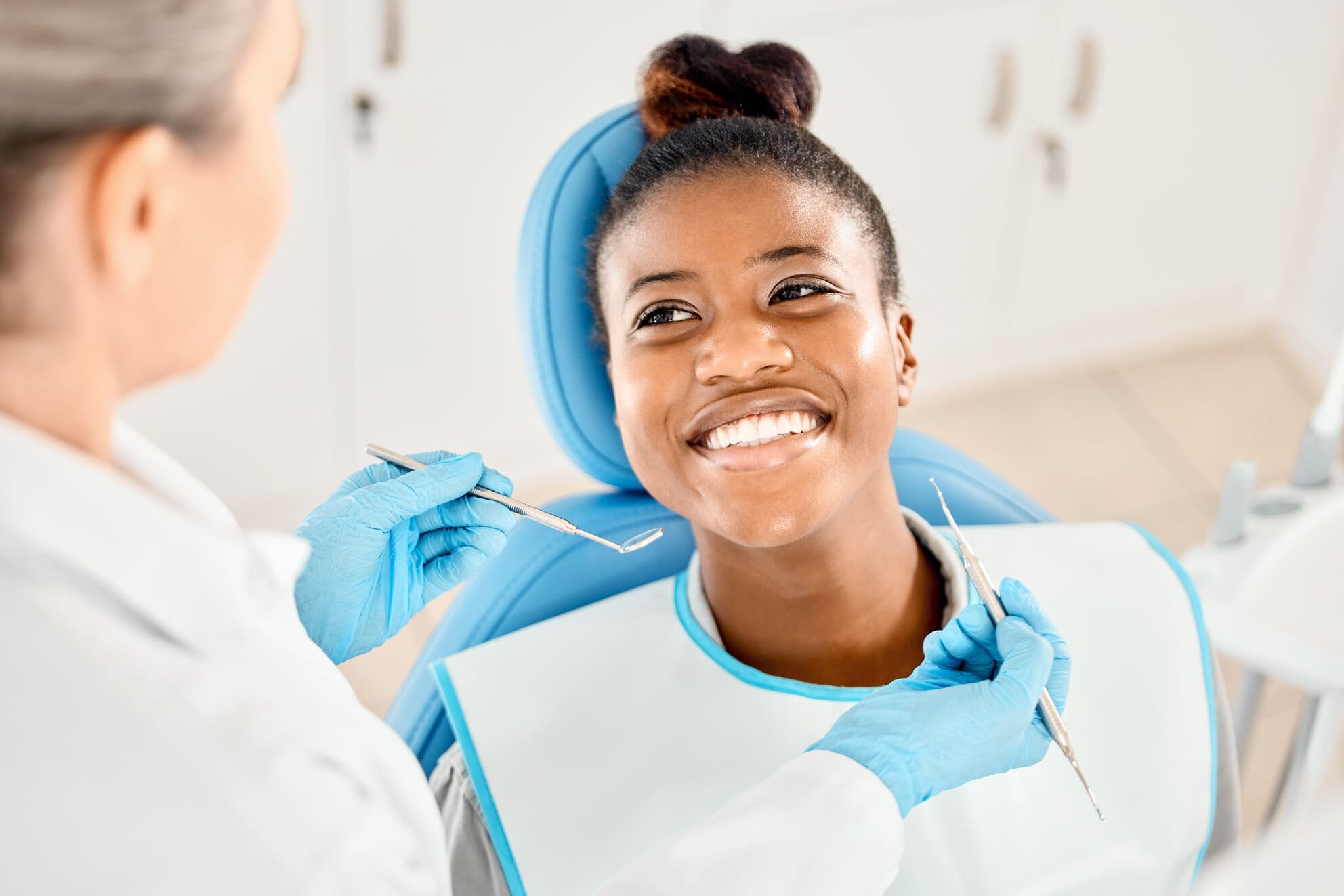A woman preparing for a root canal procedure at Sudbury Dental Arts.